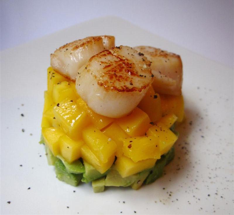 avocado and mango tower with grilled scallops